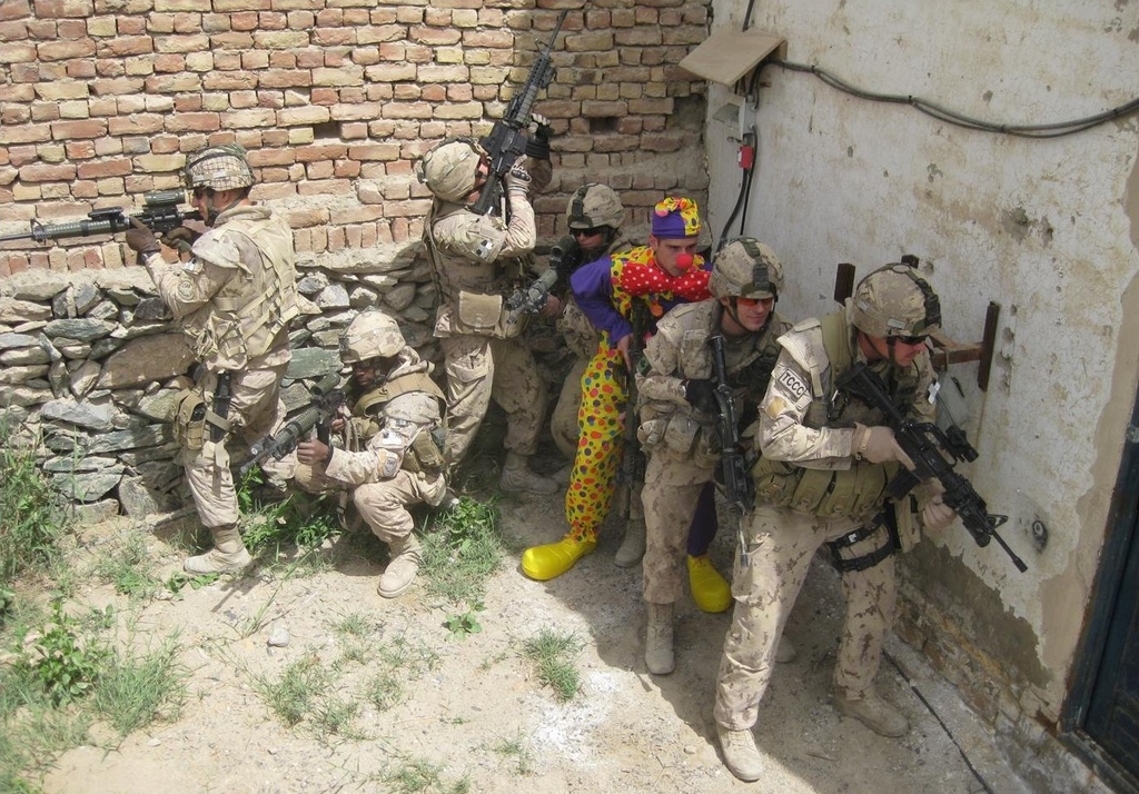 Army Soldiers With Clown Stacked Up meme template