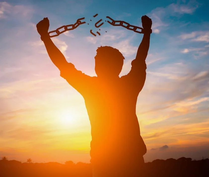 Man Breaking Chains with Sunset meme template