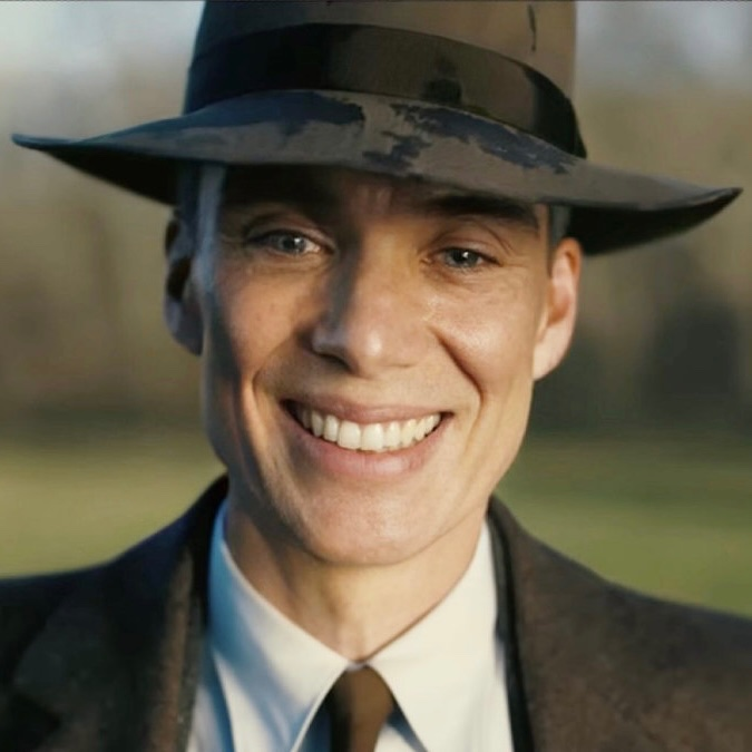 Oppenheimer in top hat meme template variation