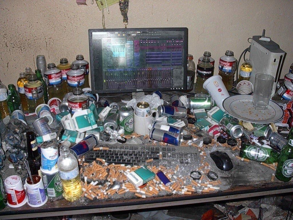 Dirty/Messy Computer Desk with Cigarettes and Trash meme template