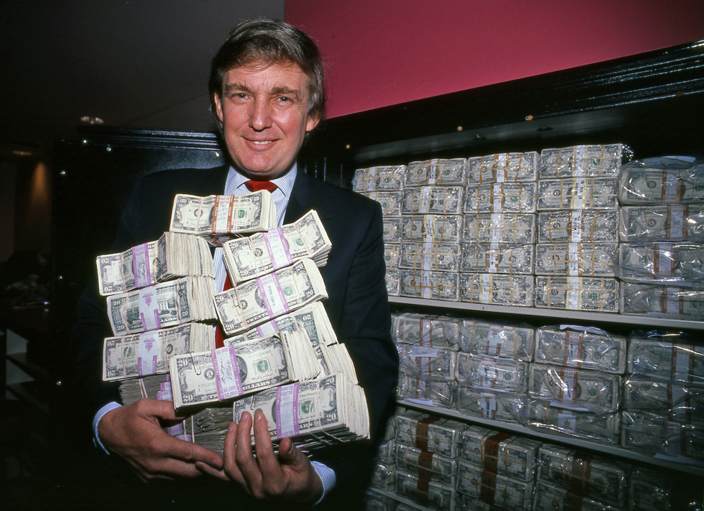 Donald Trump Holding Stacks of Cash meme template