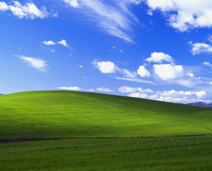 Windows Background - Hill with Blue Skies and Clouds meme template